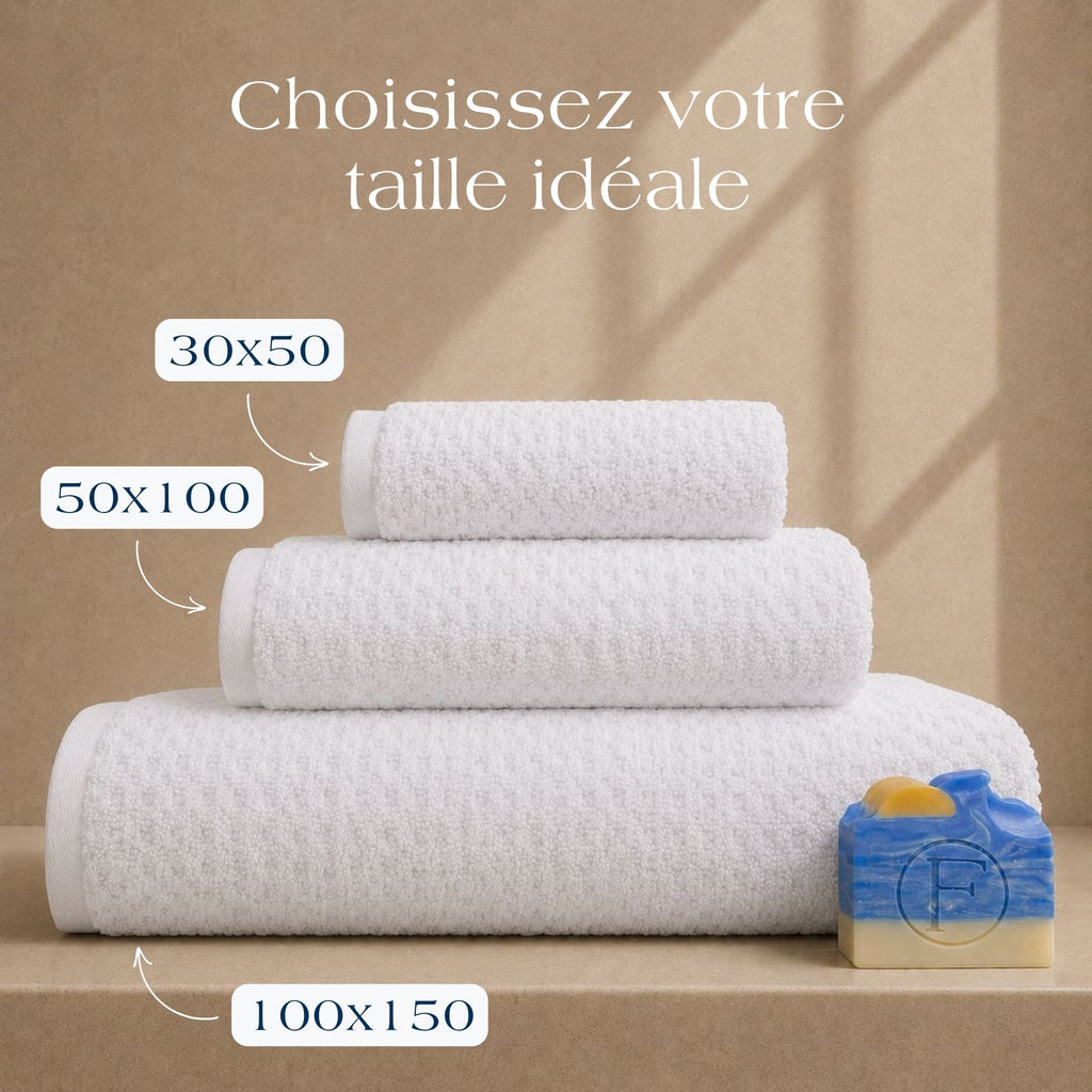 Serviettes de bain Prestige Dune Blanc Nacre FLAMARDA en 100x150cm, 50x100cm et 30x50cm confectionnées au Portugal en coton peigné