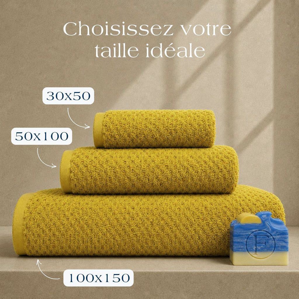 Serviettes de bain Prestige Dune Ocre Doré FLAMARDA en 100x150cm, 50x100cm et 30x50cm confectionnées au Portugal en coton peigné