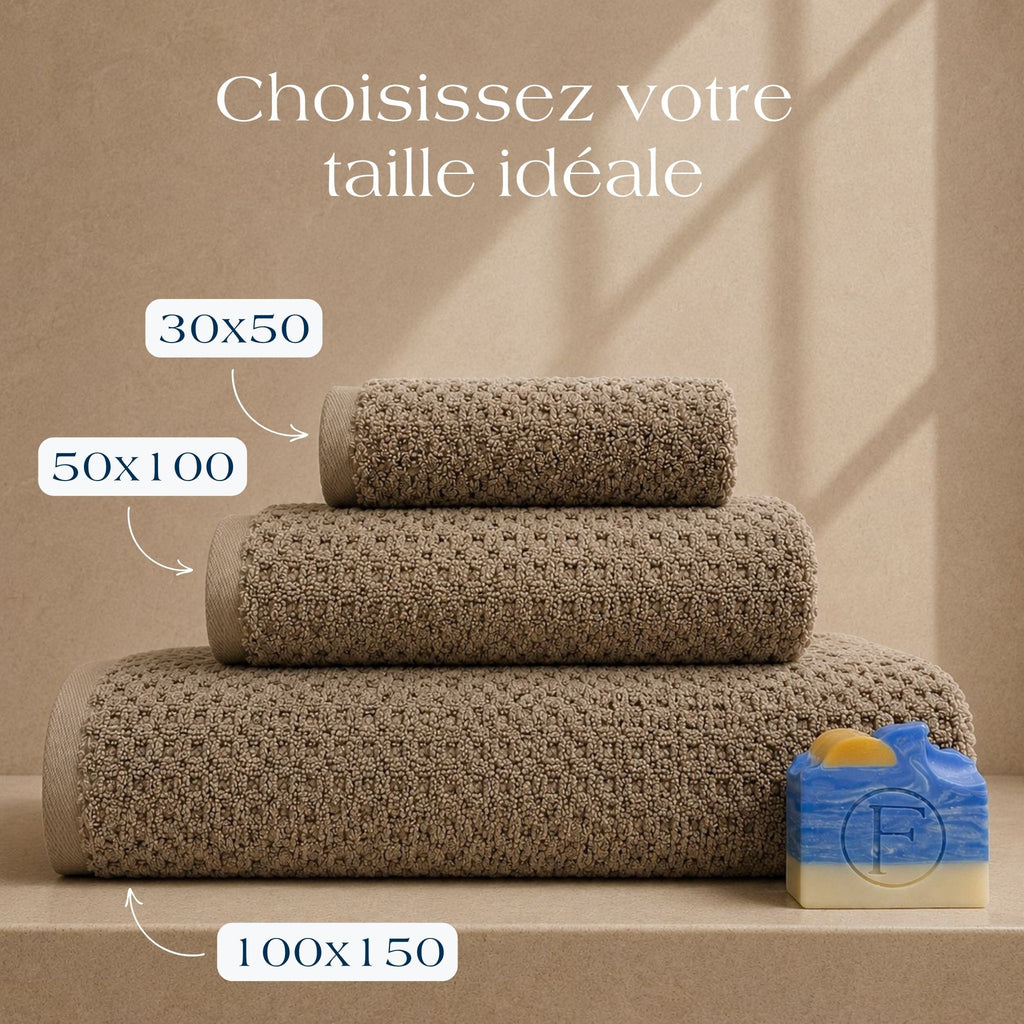 Serviettes de bain Prestige Dune Sable Brun FLAMARDA en 100x150cm, 50x100cm et 30x50cm confectionnées au Portugal en coton peigné