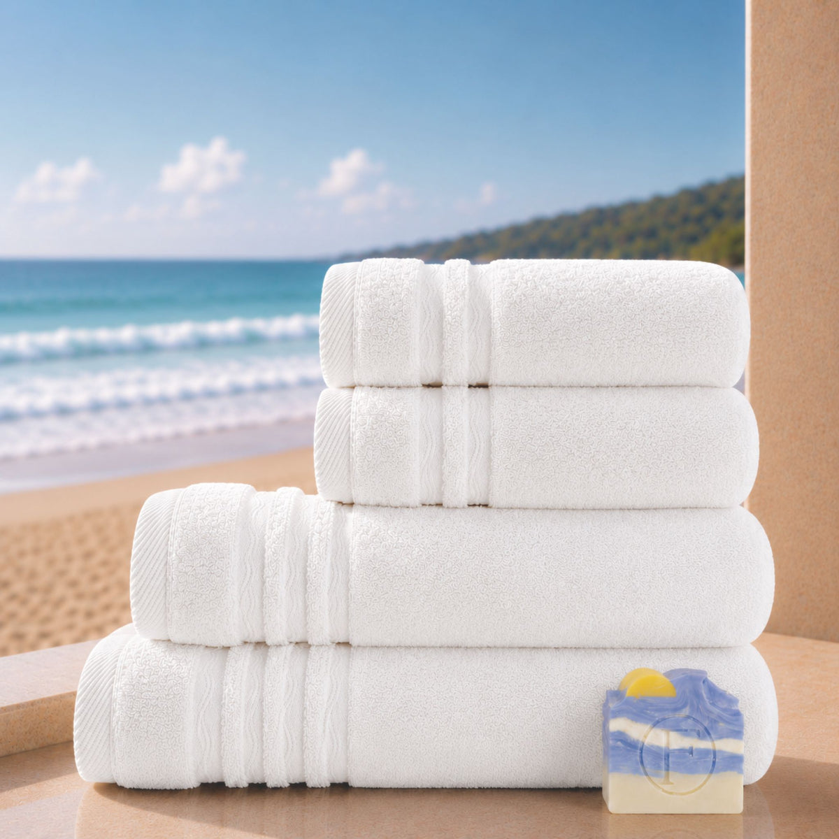 Set de Bain Duo Signature Océan Blanc Écume FLAMARDA avec deux draps de bain 70x140cm, deux serviettes de toilette 50x100cm et un savon artisanal Océan.