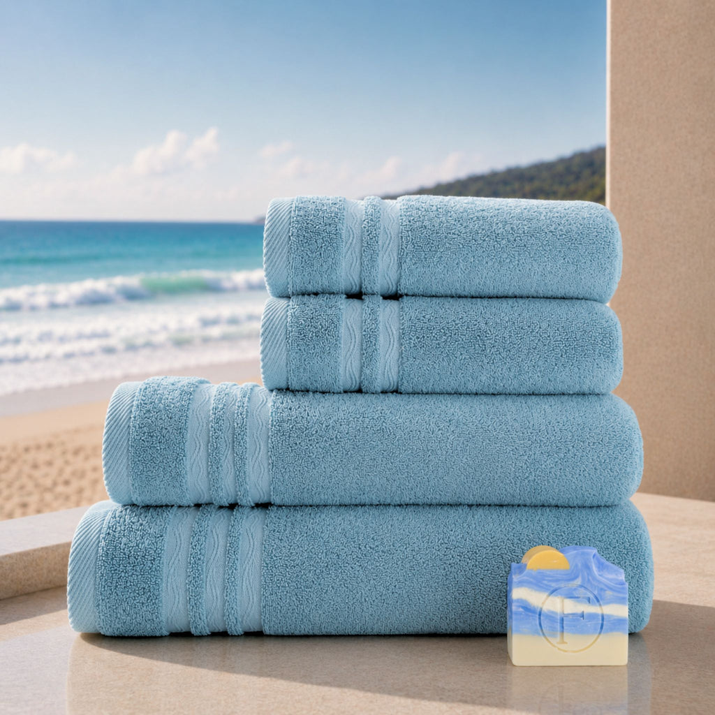 Set de Bain Duo Signature Océan Bleu Horizon FLAMARDA avec deux draps de bain 70x140cm, deux serviettes de toilette 50x100cm et un savon artisanal Océan.