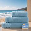 Set de Bain Essentiel Signature Océan Bleu Horizon FLAMARDA avec un grand drap de bain 100x150cm, un drap de bain 70x140cm, une serviette de toilette 50x100cm et un savon artisanal Océan.